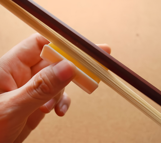 Rosin your violin bow