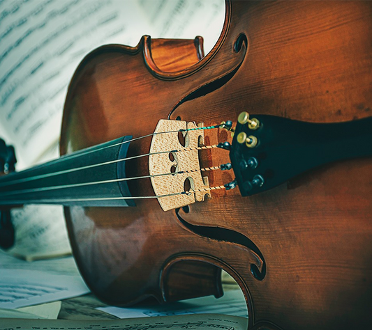 Simple Adjustments to the Violin's Sound Post and Bridge to Improve Tone