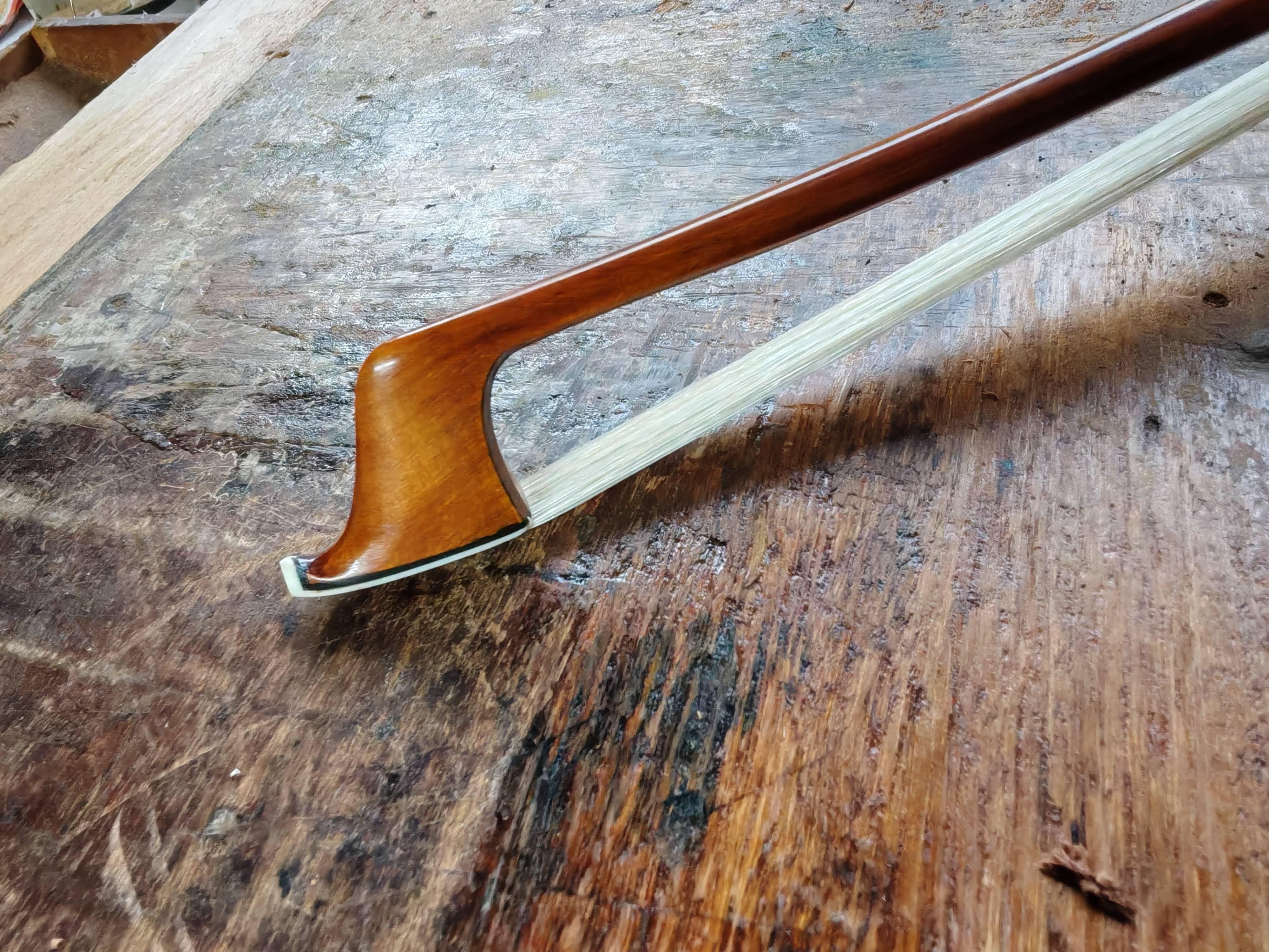 pernambuco cello bow wood grain close up
